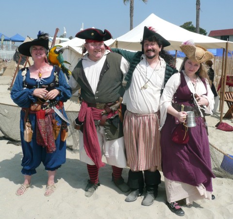 four pirates on the beach